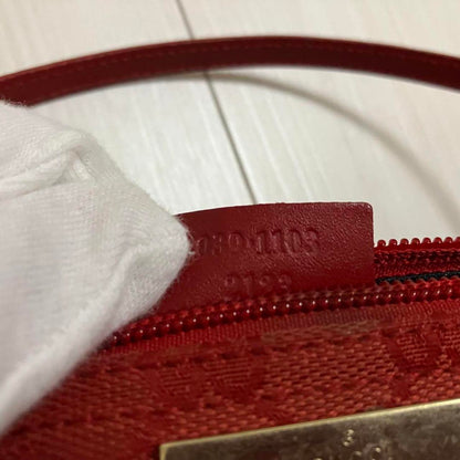 Red Gucci boat pouchette monogram bag